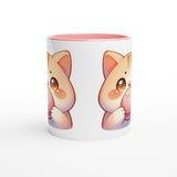 a white and pink coffee mug with a picture of a cat on it