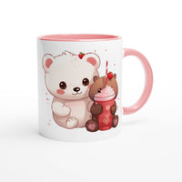 a coffee mug with a picture of a teddy bear holding a cupcake