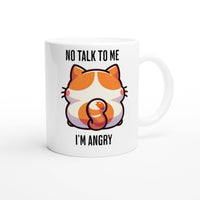 a white coffee mug with an orange and white cat on it