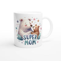 a white coffee mug with a bear and a bear hugging