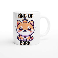 a coffee mug with a cartoon cat wearing a crown