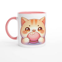 a white and pink coffee mug with a cat on it