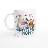 a white coffee mug with a bear and a bear hugging