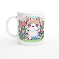 a white coffee mug with a cat on it