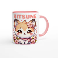 a pink and white coffee mug with a cat on it